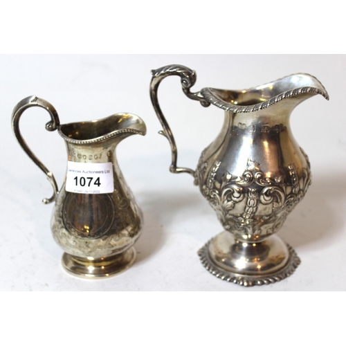 1074 - Victorian silver and floral engraved baluster form cream jug, with scroll handle, together with a Bi... 