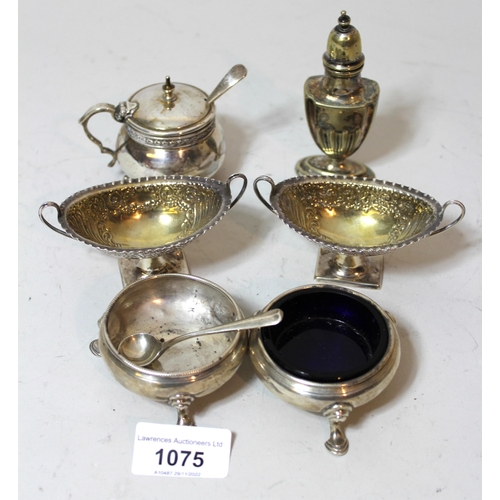 1075 - Pair of Victorian silver two handled pedestal salts, pair of silver open salts, and another silver c... 