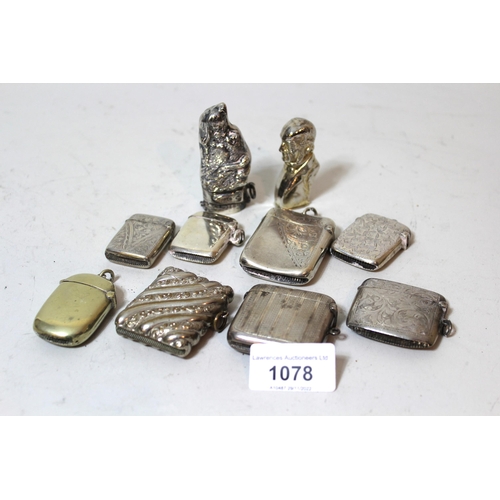 1078 - Six various silver vesta cases, together with four plated vesta cases, one in the form of a dogs hea... 