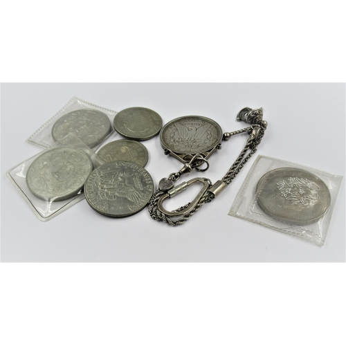 1109 - United States of America 1889 one dollar coin, mounted on a white metal fob chain, together with a s... 