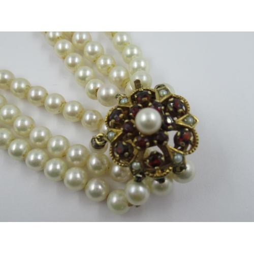 1118 - Triple row uniform cultured pearl choker with 9ct gold garnet and cultured pearl set clasp with drop... 