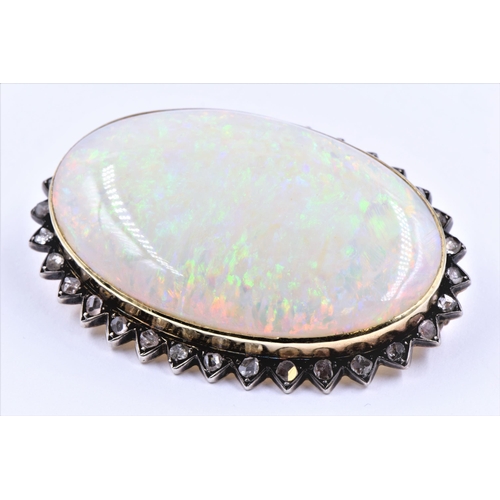 1143 - Very large opal and rose cut diamond brooch, the oval opal approximately 38mm x 25mm