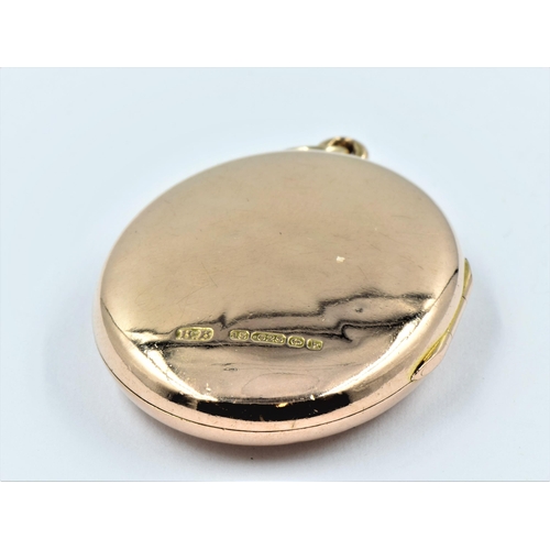 1223 - Edwardian 15ct rose gold oval locket