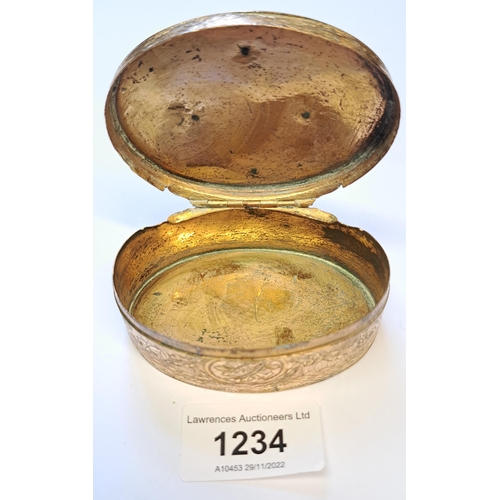 1234 - 19th Century oval gilt metal snuff box with cast decoration, 80mm wide