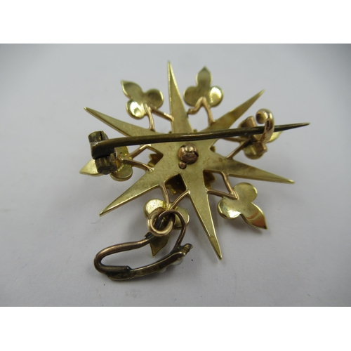 1254 - Victorian unmarked yellow metal and split pearl set star form pendant/brooch, 31mm diameter, 6.2gms