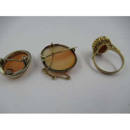 1256 - 9ct Gold cameo set ring together with two small cameo brooches