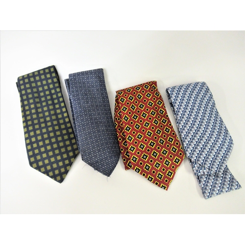 126 - Four various silk ties including Hermes, two Gucci and Hugo Boss