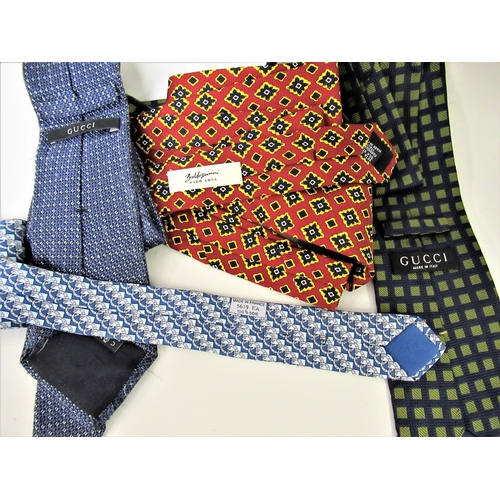 126 - Four various silk ties including Hermes, two Gucci and Hugo Boss