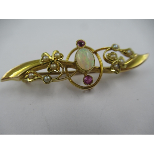 1262 - 15ct Gold opal, pink ruby and split pearl brooch, 42mm wide, 2.9gms