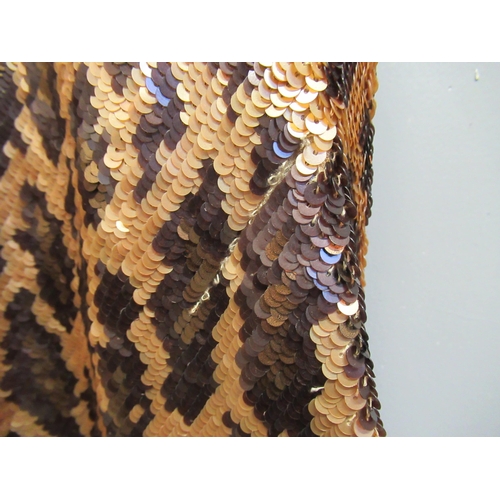 128 - Jenny Packham, short sleeveless sequin evening dress in a leopard print pattern (at fault), approxim... 
