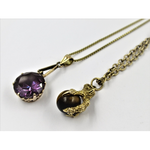 1285 - 14ct Gold mounted amethyst pendant suspended from an 18ct gold chain and a 9ct gold tigers eye set p... 