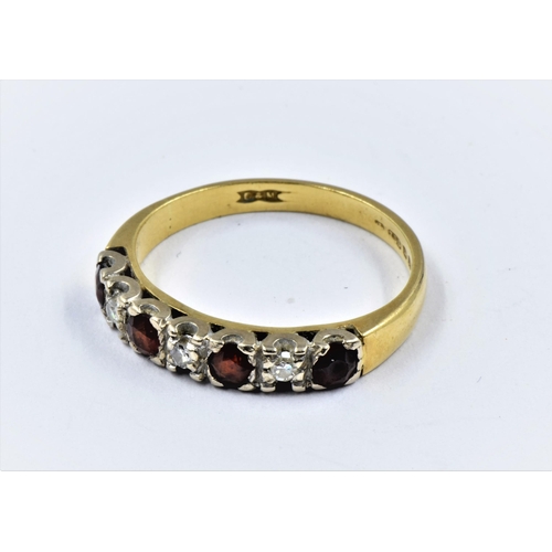 1291 - 18ct Gold ring set four rubies and three diamonds, size 'L'