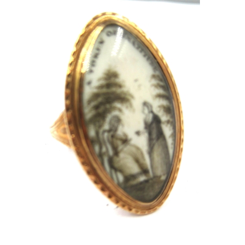 1310 - George III gold ring inset with a bone plaque inscribed 'A token of gratitude' and further decoratio... 