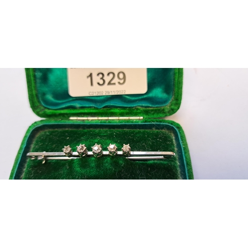 1329 - Early 20th Century white metal, bar brooch set with five old cut diamonds