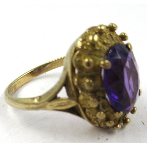 1340 - 9ct Gold dress ring set oval amethyst, gross weight 6.6g