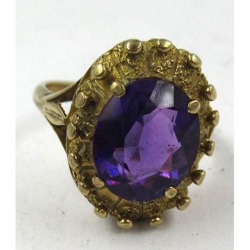 1340 - 9ct Gold dress ring set oval amethyst, gross weight 6.6g