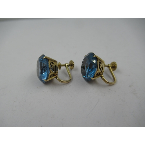 1354 - Pair of 14ct gold blue stone set screw fitting earrings, gross weight 6.5g