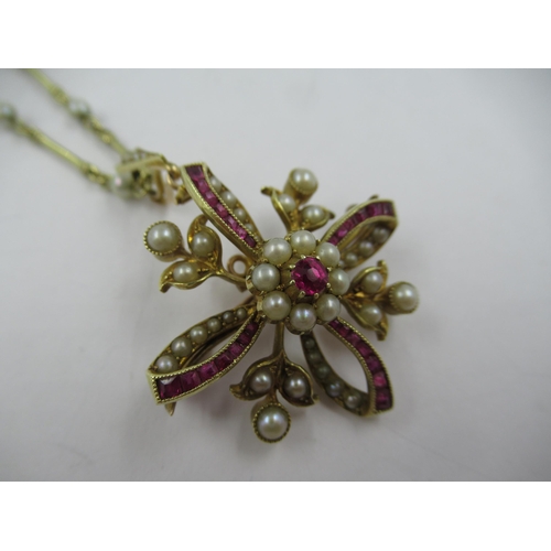 1356 - Edwardian 15ct gold brooch set rubies and pearls suspended from a 9ct gold chain interspaced with pe... 