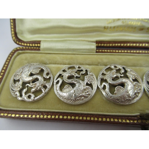 1397 - Boxed set of six Chinese silver dragon motif buttons