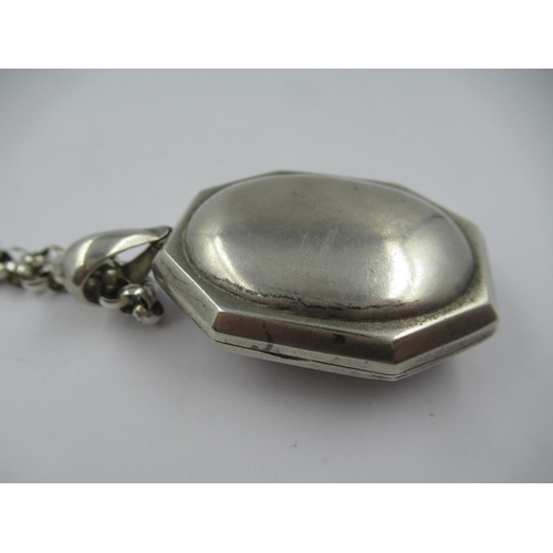 1398 - Victorian octagonal silver locket on chain of Aesthetic design