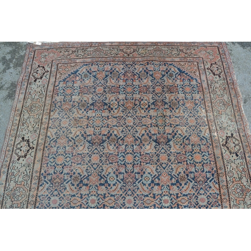 14 - Feraghan rug with all-over Herati design on a midnight blue ground with borders, 8ft x 5ft approxima... 