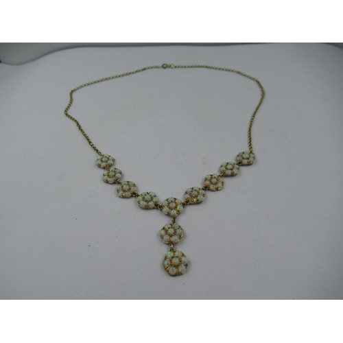 1404 - 9ct Gold opal set multiple flowerhead necklet