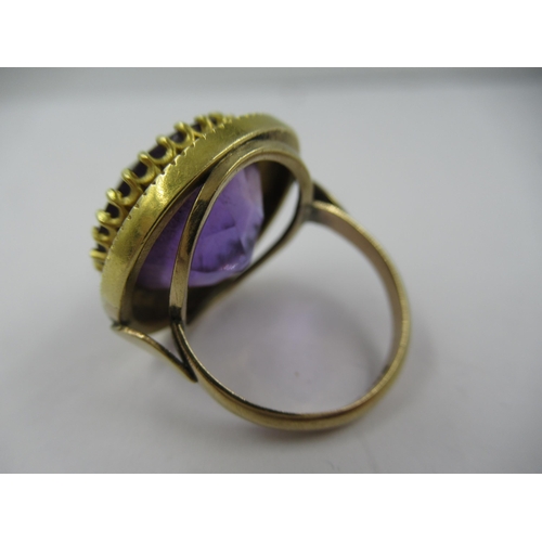 1408 - Large Victorian circular 9ct gold amethyst set dress ring, size 'L'