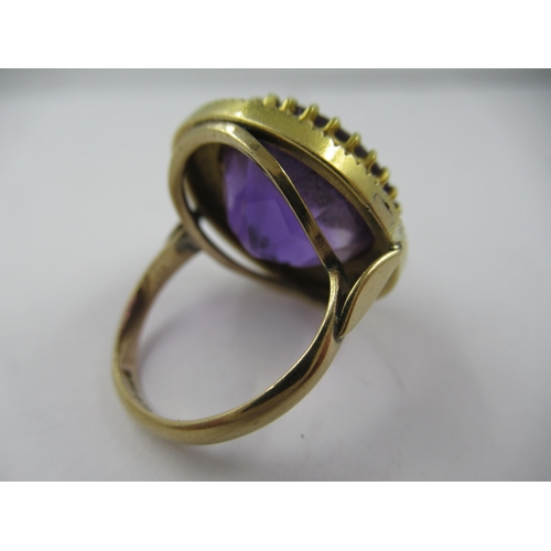 1408 - Large Victorian circular 9ct gold amethyst set dress ring, size 'L'