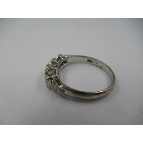 1418 - 18ct White gold four stone diamond ring, size 'L'