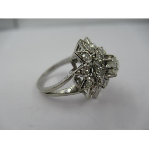 1429 - French 18ct white gold diamond set star shaped cocktail ring, size 'K'