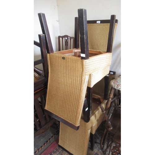 144 - Set of four modern Lloyd Loom beechwood and cane dining chairs