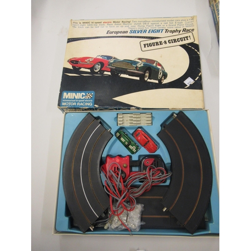 147 - Minic GT miniaturised high speed electric motor racing set, in original box, Jaguar E-type and Aston... 