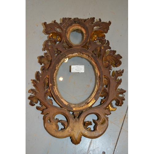 1472 - Small late 19th / early 20th Century Florentine carved and gilded picture frame of oval pierced flor... 