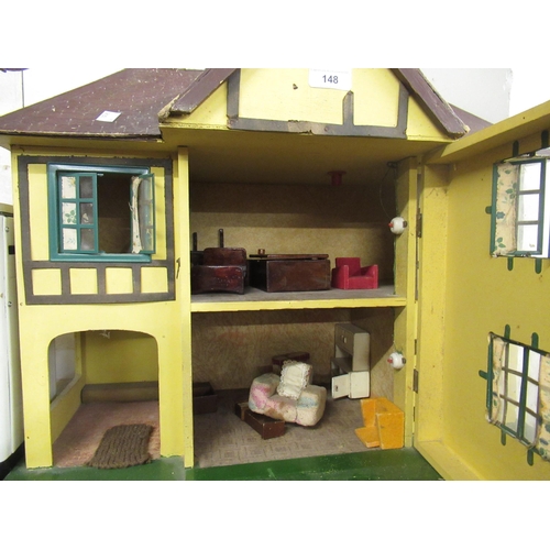 148 - Mid 20th Century Tri-ang dolls house with a quantity of period furniture, together with a dolls Hoov... 