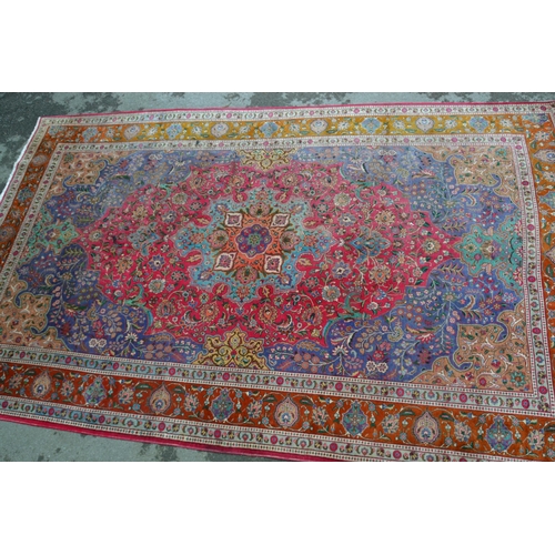 16 - Large Tabriz carpet with a medallion and all-over polychrome floral design, 16ft x 10ft approximatel... 