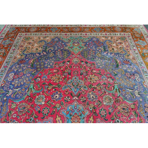 16 - Large Tabriz carpet with a medallion and all-over polychrome floral design, 16ft x 10ft approximatel... 