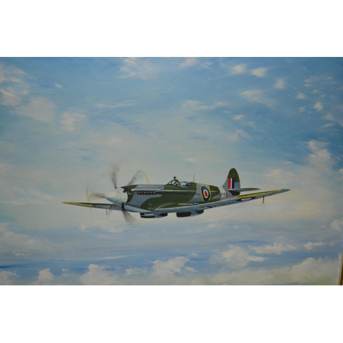 1640 - Oil on board, a Spitfire mark 14 in flight, signed Fishburn, 19ins x 23ins, framed