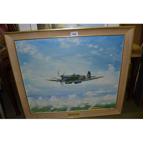 1640 - Oil on board, a Spitfire mark 14 in flight, signed Fishburn, 19ins x 23ins, framed