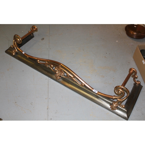 1897 - Good quality polished copper and steel fire kerb of stylised floral design, 53ins wide