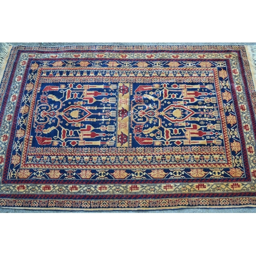 19 - Two modern Afghan Belouch rugs on gold ground, each approximately 5ft x 3ft