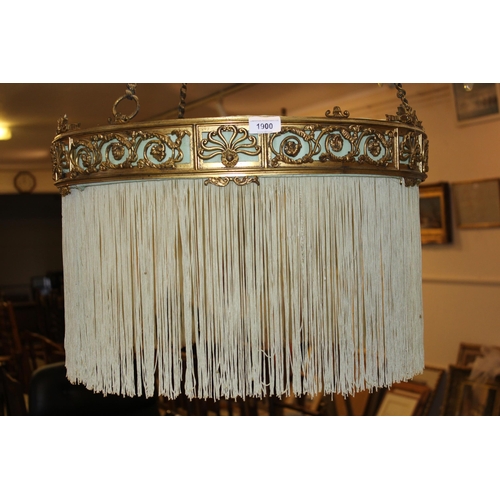 1900 - Edwardian brass rise and fall light fitting of circular pierced design, 21ins diameter