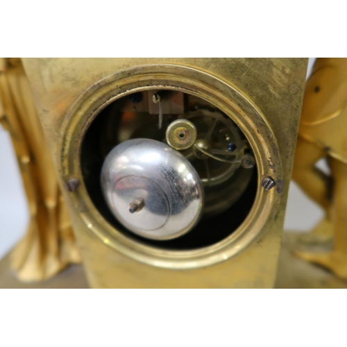 1915 - Early 19th Century French ormolu mantel clock, the circular enamel dial flanked by two figures of an... 