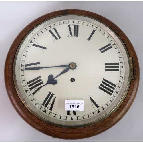 1916 - Oak cased circular wall clock, the painted 10in dial with Roman numerals and single train fusee move... 