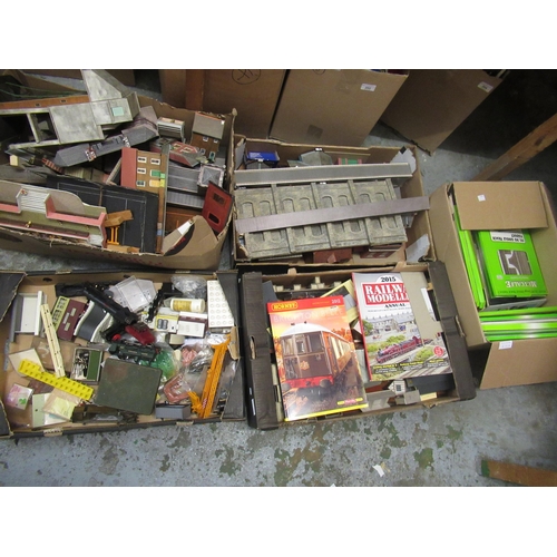 223 - Four boxes containing a large collection of various railway buildings, magazines, engines and access... 