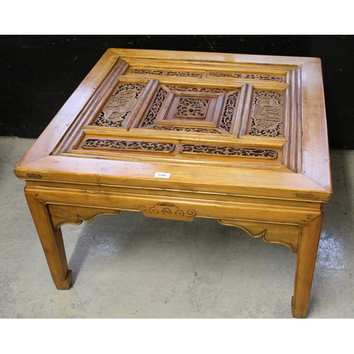 2306 - 20th Century Chinese elm square coffee table, the carved top raised on square moulded supports