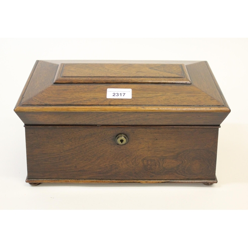 2317 - William IV rosewood sarcophagus shaped tea caddy with lion mask side handles and glass mixing bowl