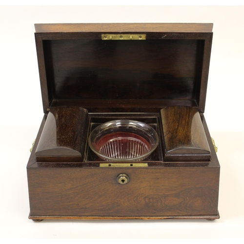 2317 - William IV rosewood sarcophagus shaped tea caddy with lion mask side handles and glass mixing bowl