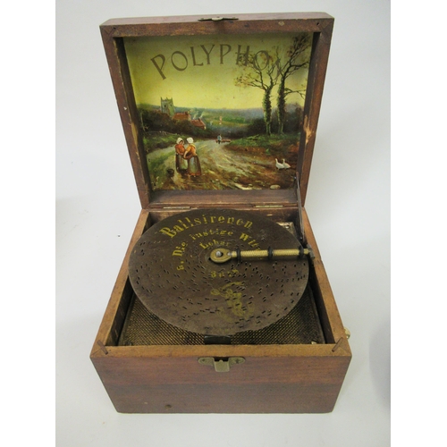 2329 - Small mahogany cased polyphon with various discs, discs 6.5ins diameter