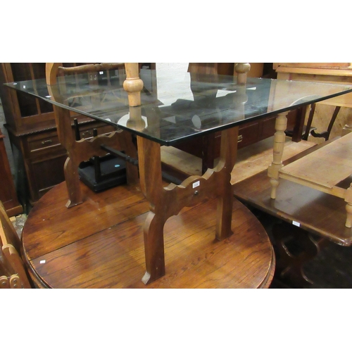 2335 - 20th Century walnut plate glass and wrought iron dining table in Spanish style, 60ins x 36ins (chips... 