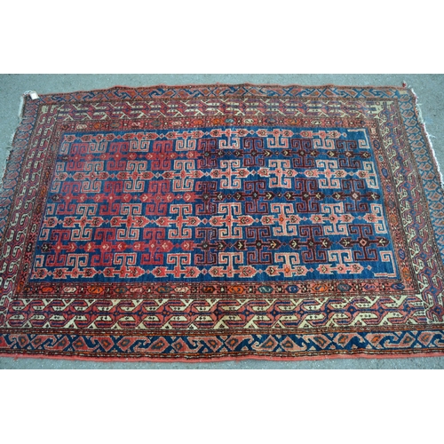 27 - Kurdish rug with an all-over hooked medallion design on a deep blue ground with multiple border, 6ft... 